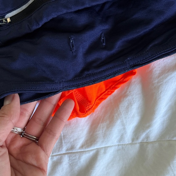 Rabbit Women's neon orange & navy trail Shorts - Picture 4 of 5